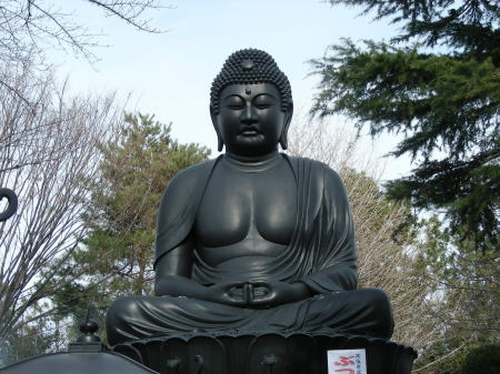 啧